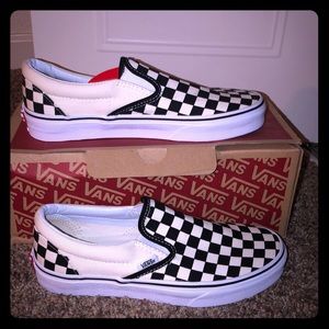 Checkered black and white branded new Vans.